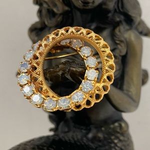 Vintage double circle loop knot brooch pin, textured gold tone & faux opal. Used